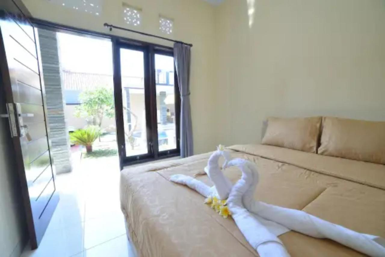Oyo Flagship 91237 Ratu Guest House Kedunganan Luaran gambar