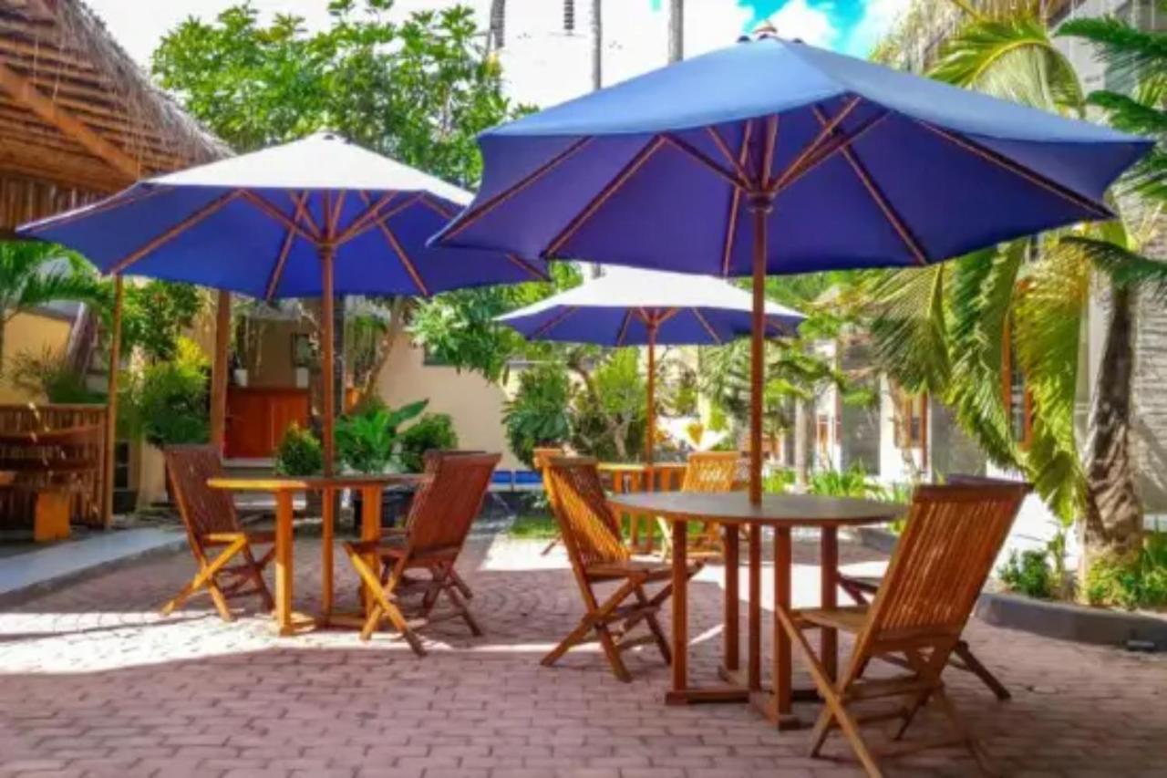 Oyo Flagship 91237 Ratu Guest House Kedunganan Luaran gambar