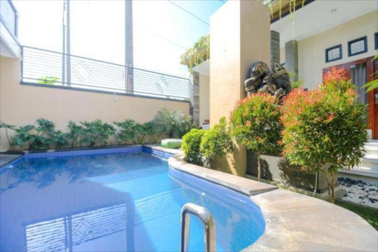Oyo Flagship 91237 Ratu Guest House Kedunganan Luaran gambar