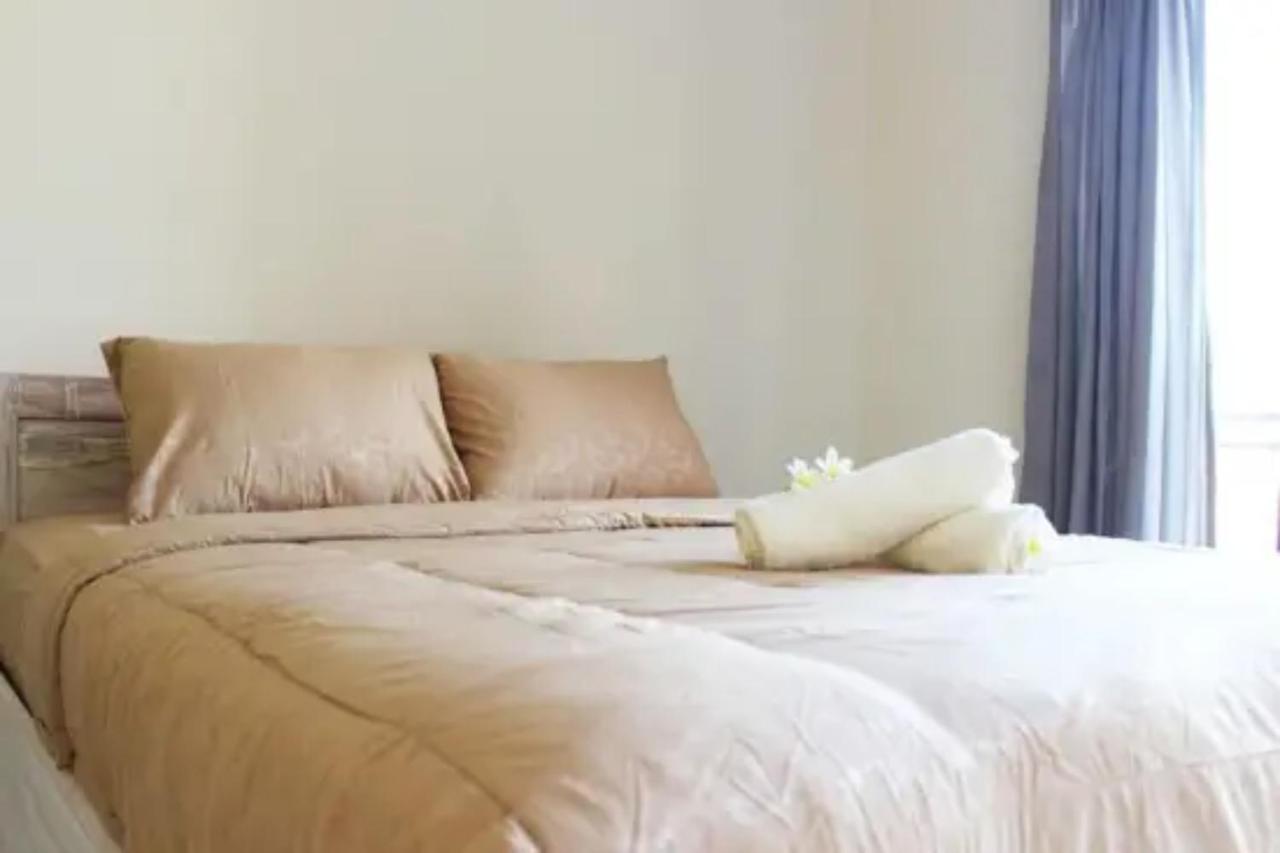 Oyo Flagship 91237 Ratu Guest House Kedunganan Luaran gambar