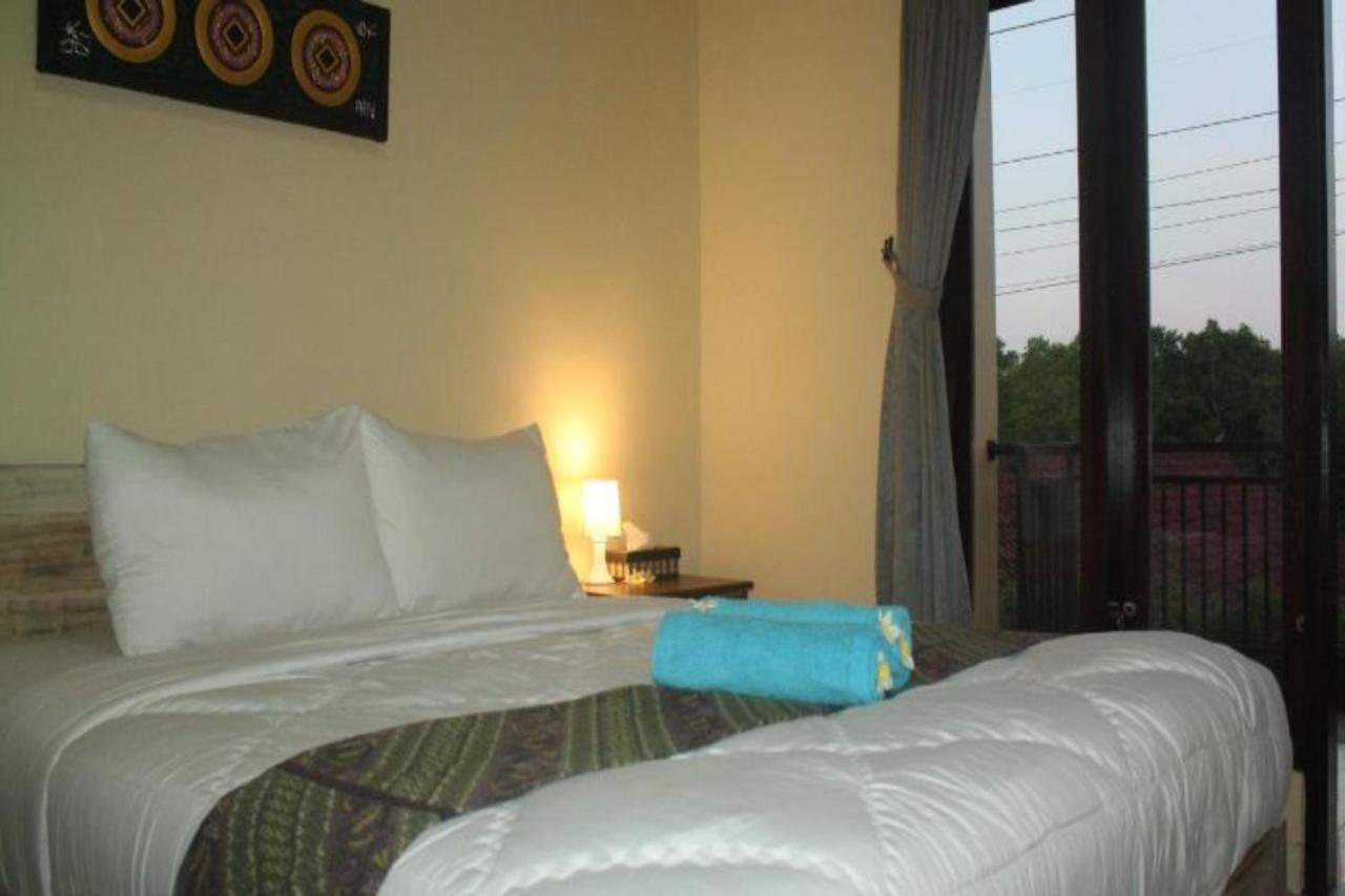 Oyo Flagship 91237 Ratu Guest House Kedunganan Luaran gambar